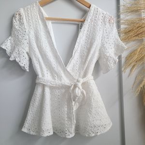 Eyelet peplum blouse
